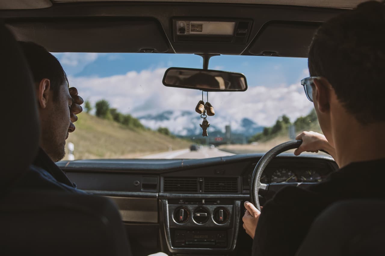 Instructor and learner driver in the front seats on a lesson